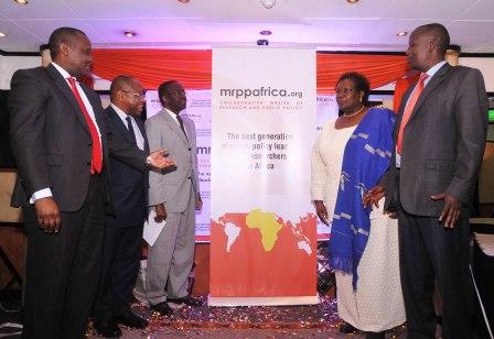 (L-R) Mr Henry Rotich, Prof Tade Aina, Dr Willy Mutunga, Prof Judith Bahemuka and Hon Julius Melly declare the MRPP officially launched